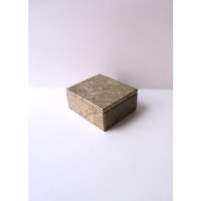 A neutral hue stone box, jewelry or decorative, in the Modern or Minimalist styles, circa late-20th century. A great piece...