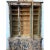 This impressive 18th century Henry II-style cabinet showcases a strong architectural presence, defined by fluted...