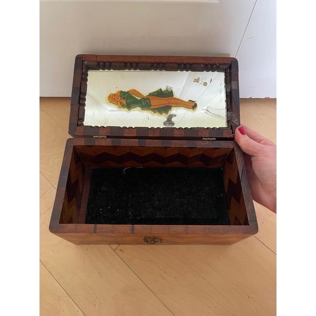 This product is a unique handmade antique wooden box featuring geometric herringbone chevron parquetry inlay. The...