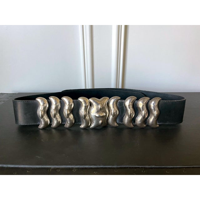 A wide leather belt with sterling silver buckle and matching ornaments crafted by Graziella Laffi (1923-2009), Lima, Peru,...