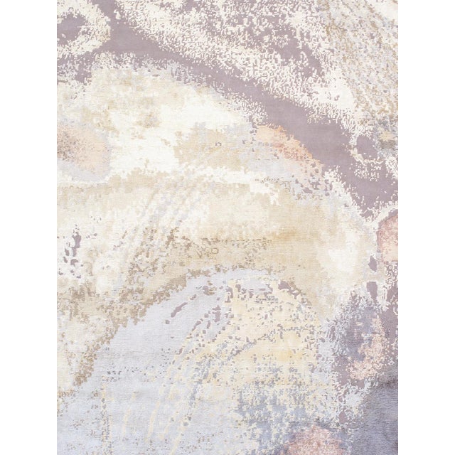 The Modern Collection explores hand-knotted designs through abstract patterning, solid tonal fields, and subtle surface...