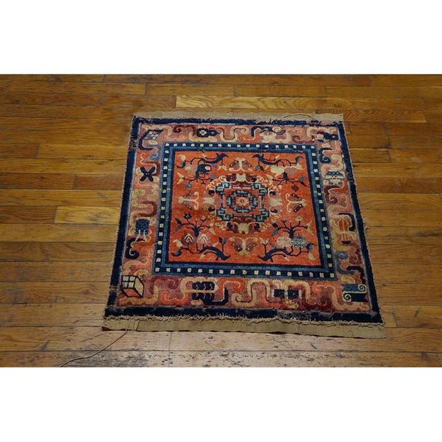 Antique Hand Knotted Floral Medallion Wool Square Yellow 1900s Rug, Circa Date: 1900s. This exceptional example of antique...