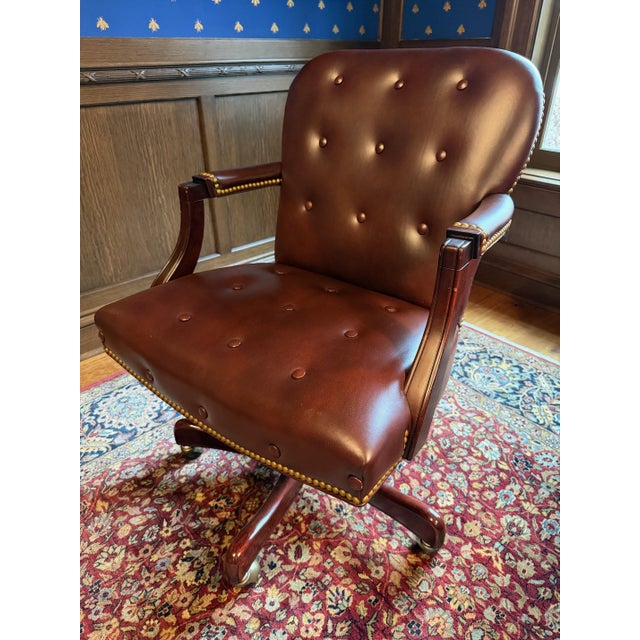 Georgetown Swivel-Tilt Chair in brown. Swivels side-to-side, tilts front-to-back, and also adjusts in height. Lushly...