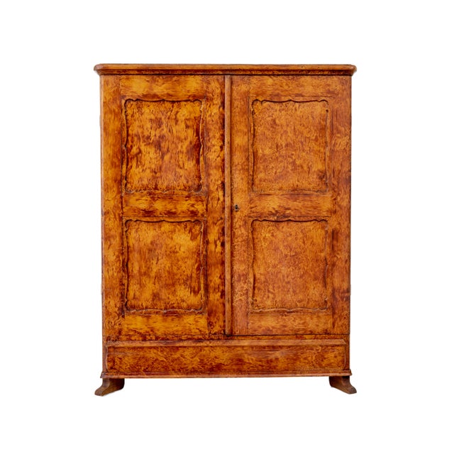 Good quality traditional swedish cupboard circa 1860. presented in its original rag work paint effect. Double doors open...