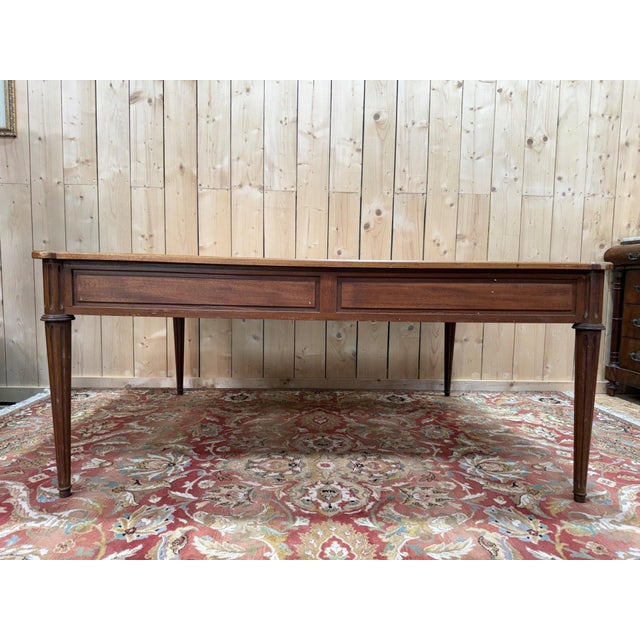 Large louis xvi style work table in stained beech, circa 1970. the rectangular top has slightly rounded corners and...