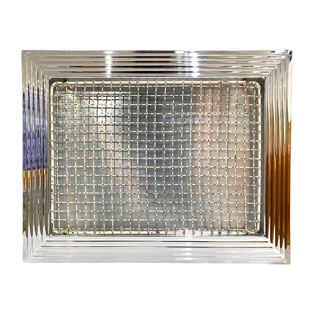 A refined example of Art Deco and American Machine Age design, this "Manhattan" tray by Norman Bel Geddes for Revere...