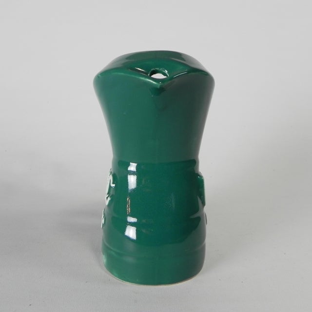 This carafe was used for the water poured into a glass containing Pastis PEC 45. Pastis is a popular anise-based drink,...