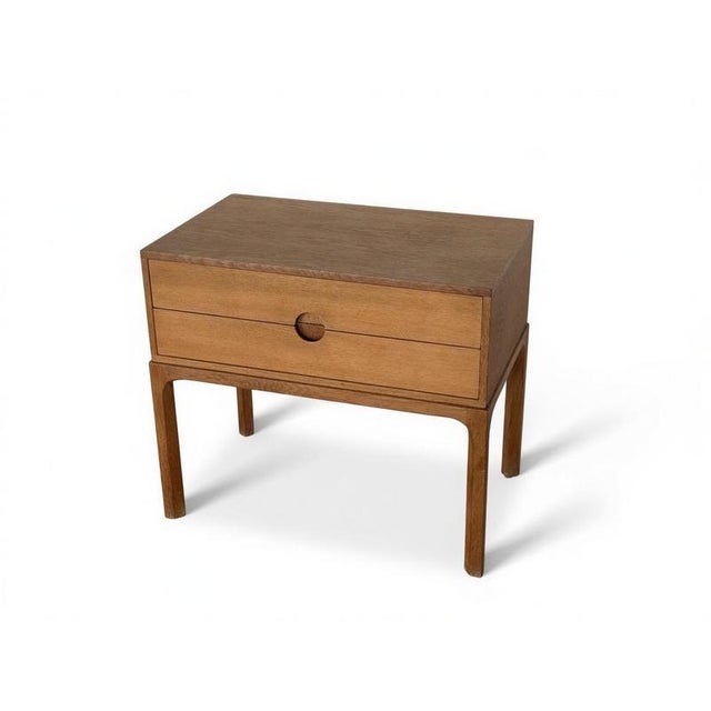 Kai Kristiansen for Aksel Kjersgaard, Denmark, 1960s Elegant Danish Modern wall-mounted set consisting of a two-drawer...