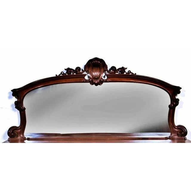 Victorian sideboard English, 19th century in mahogany wood. with a trundle and two doors. Bronze applications "bunch of...