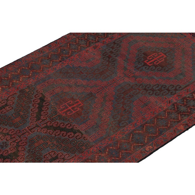 Hand knotted in wool, this 6x8 Baluch rug represents a new line of tribal carpets in the Modern Classics Collection by Rug...