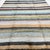 This contemporary Turkish Tulu rug reinterprets traditional Anatolian weaving through a clean, modern lens. Handknotted in...