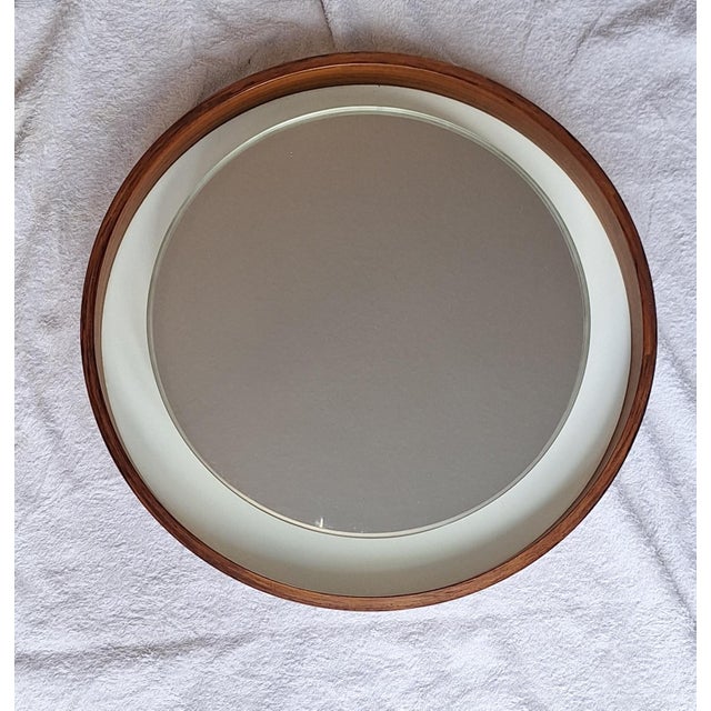 Vintage Round Illuminated Wall Mirror with Teak Frame, 1970s, in Very Good conditions. Designed 1970 to 1979