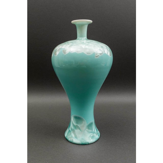 John Richard Powder Blue Mother Of Pearl Porcelain Vase. Measures approximately 6 1/2" diameter, 13 1/2" high.