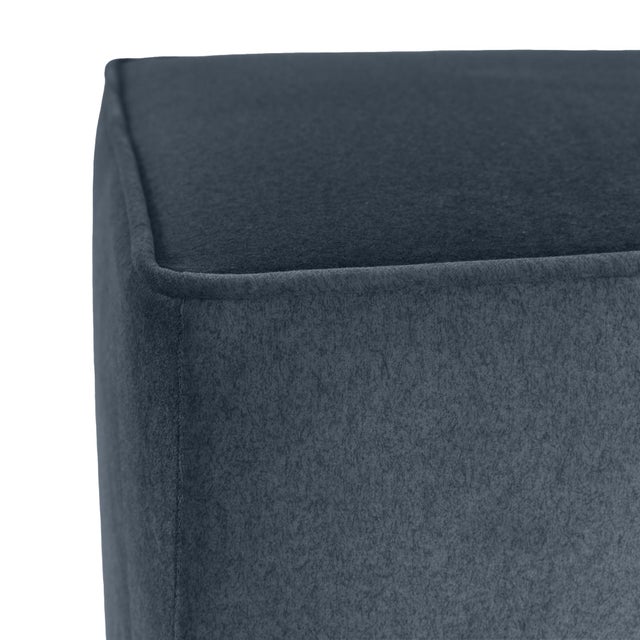 This rich denim blue wool-blend fabric combines timeless color with a soft, felted finish that adds warmth and depth to...
