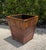 A handsome vintage square cachepot crafted with bamboo trim, vertically wrapped bamboo detailing, and wood panel...