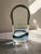 An exceptional and sophisticated vintage ice bucket (or decorative basket) crafted from fine hand-blown Murano glass. This...