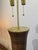 This is an awesome vintage pencil reed bamboo vase - very large scale and stylish. Sits a top a heavy brass base and...