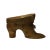 This is a decorative wood carving in heel shape with dots and ribbon accent figure. Dimensions: w10.5"x 4.5"x h6" Origin:...