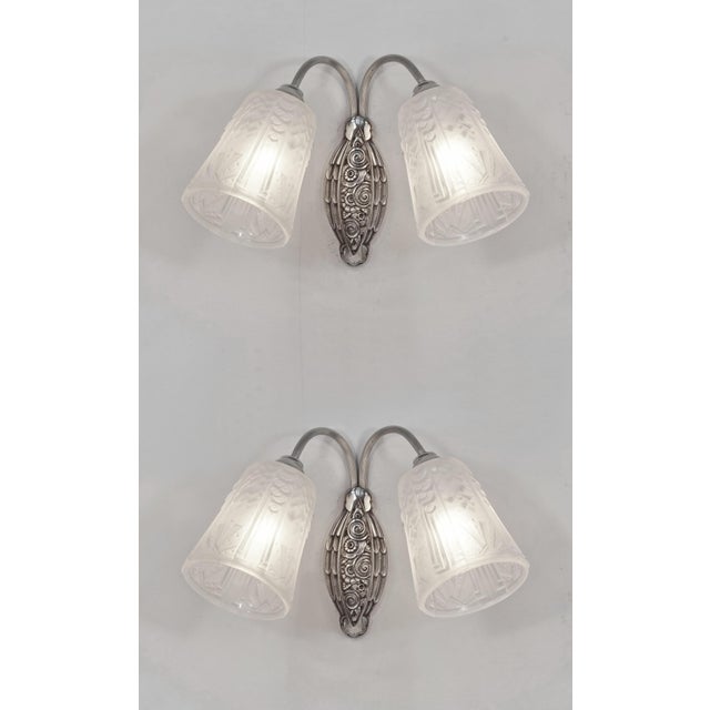 M. Hudry & Muller frères A beautiful pair of 1925-1930 French art deco wall sconces in nickel plated solid brass or bronze...