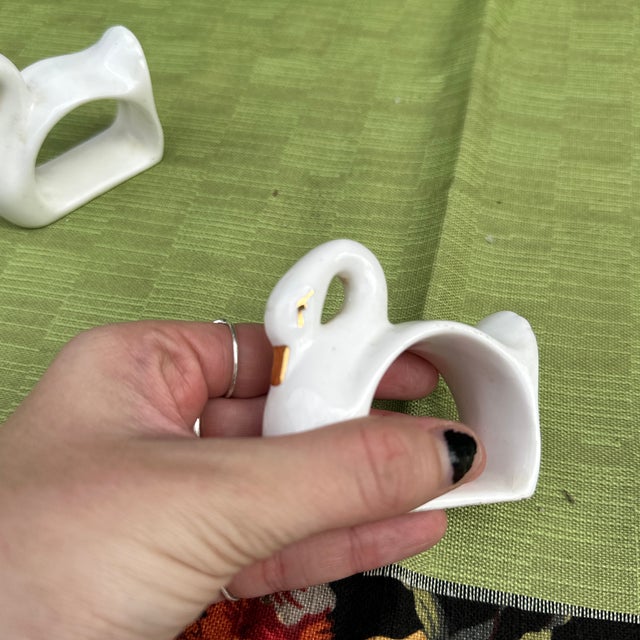 Up for consideration is a beautiful pair of ceramic white swan napkin rings. These would look lovely in your home and they...