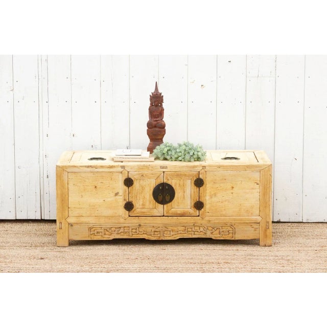 Full of character this antique low altar cabinet has an organic bleached finish and features two small front doors. This...