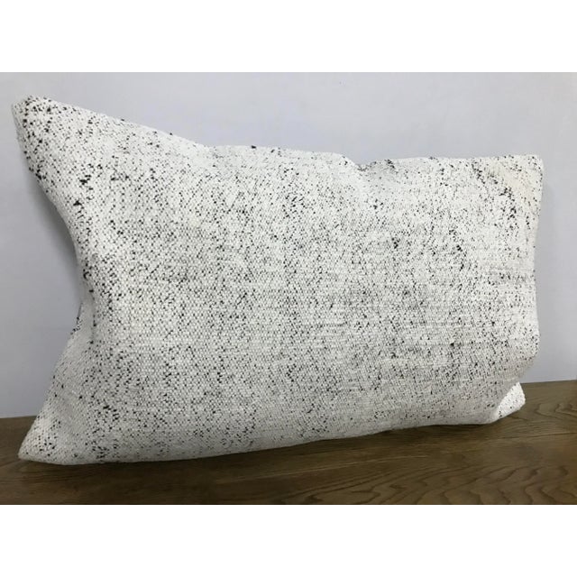 This is a vintage Turkish Anatolian kilim rug from the 1960s. The piece was hand-woven. Just cover no insert