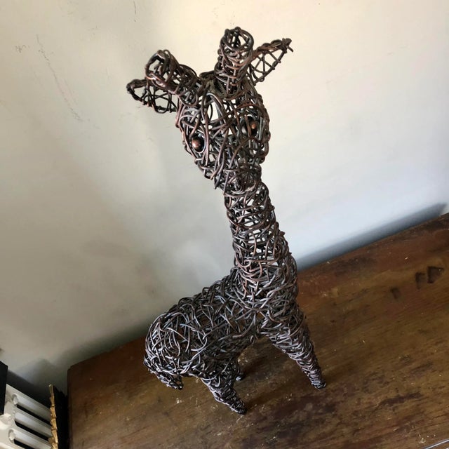 Vintage dark stained wicker giraffe.