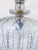 Parachute chandelier with hand cut dome, octagon chain, plain chain and 30% leaded teardrop crystals. It has a Edison base...