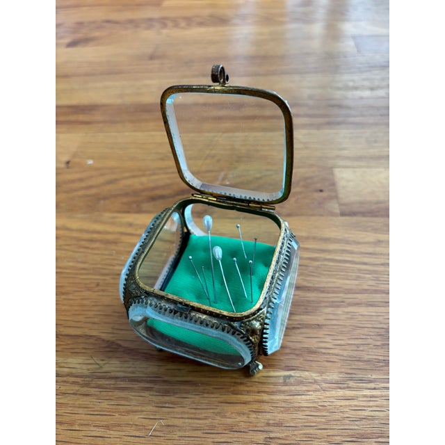 * Elegant antique vitrine trinket box raised on decorative scroll feet * Ornate brass ormolu frame with a beautiful,...