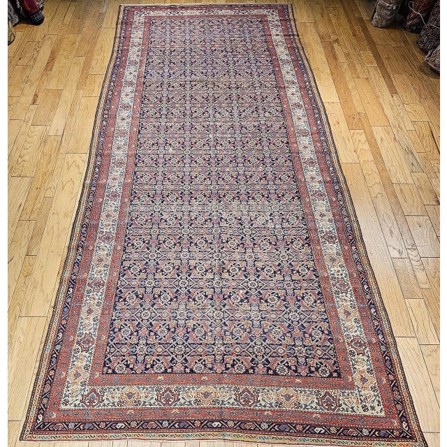 "19th Century Persian Farahan Gallery Rug hand-knotted in Western Persia. This example features a finely drawn allover...