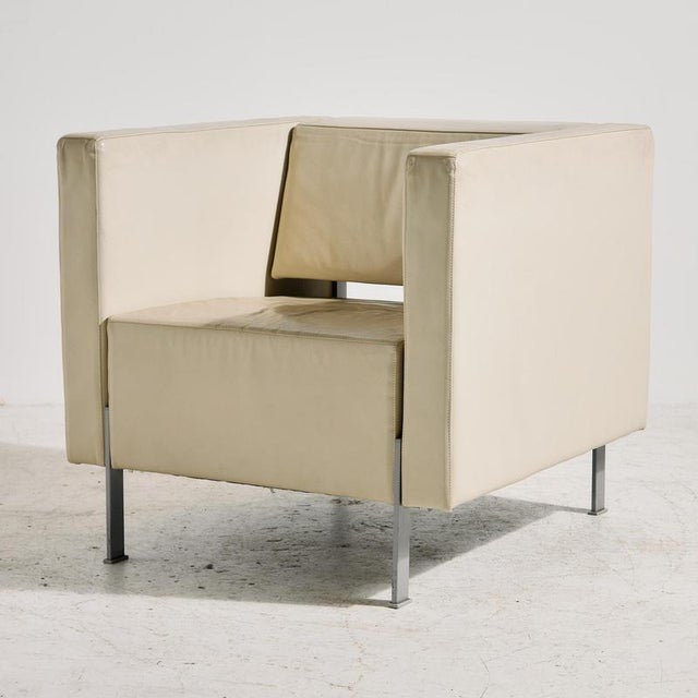 Kinnarps armchair with angular shapes from the 2000s. The frame is made of metal and covered with comfortable leather...