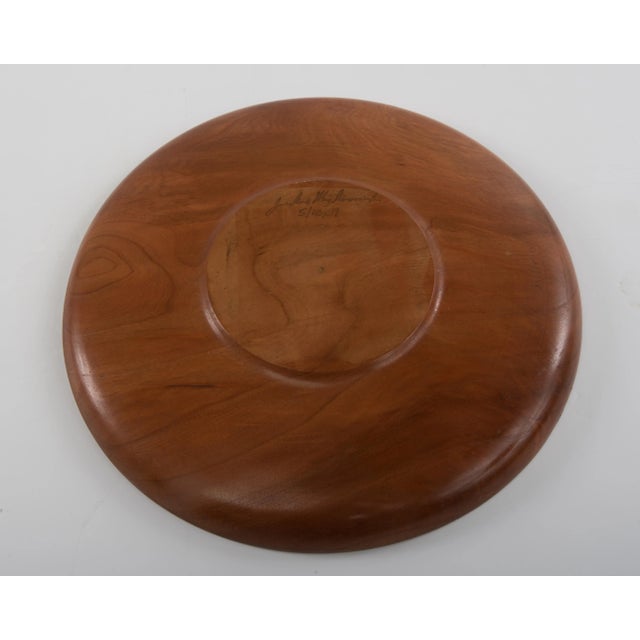 A large 11" vintage hand turned round wood cherry plate, tray or charger in a light natural finish. Stand not included....