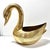 An elegant vintage brass swan cachepot with refined proportions and intricate feather detailing, finished in a warm golden...