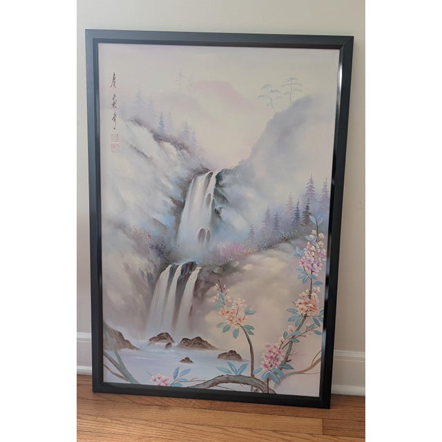 This is an East Asian-style landscape oil painting (shanshui-inspired decor art) featuring a cascading waterfall, misty...