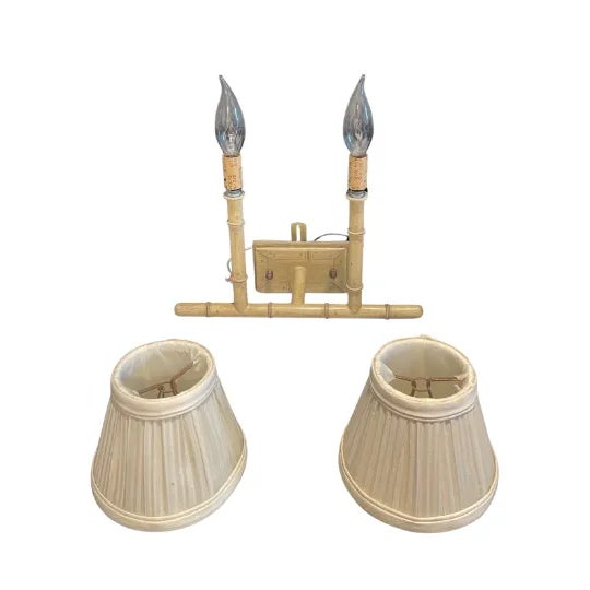 . Size: 11.5"W x 4.5"D x 13"H . Single, double armed sconce with two silk shades . Faux bamboo frame . Brass details ....