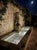 Vintage Weathered Cast Stone Lion Wall Fountain For Sale - Image 9 of 12