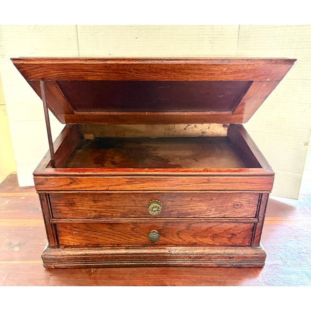 RARE John J. Clark two-drawer slant-top oak spool cabinet. It Has Intact Internal Dividers wooden spool tracks inside the...