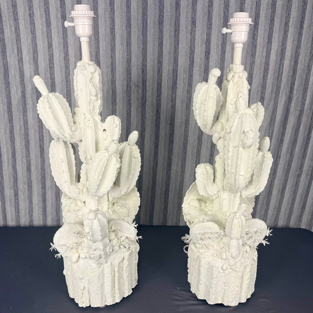 Fabulous pair of hand carved cactus lamps finished in white plaster. Dating from about the 1990s?, the plaster has been...