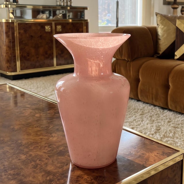 1970s Murano vase masterfully hand-blown in Italy. Crafted by Maestro del Vetro, this piece exemplifies the timeless...