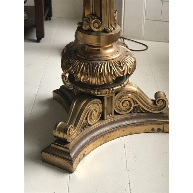 Pair of beautiful late 19th-early 20th century gilt bronze centre tables with ornately cast columns and scrolled triform...