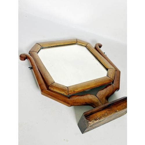 Wooden mirror, France, 1950s, a decorative piece with an original and inviting design. It is distinguished by its...