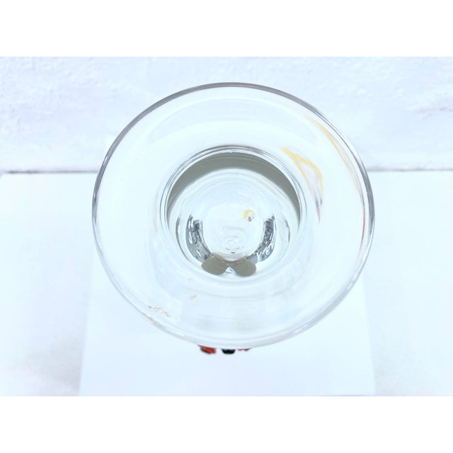 One bottle with a lid in the shape of an abstract woman, designed in the 1980s by Mario Bellini for Rosenthal. Glass. Good...