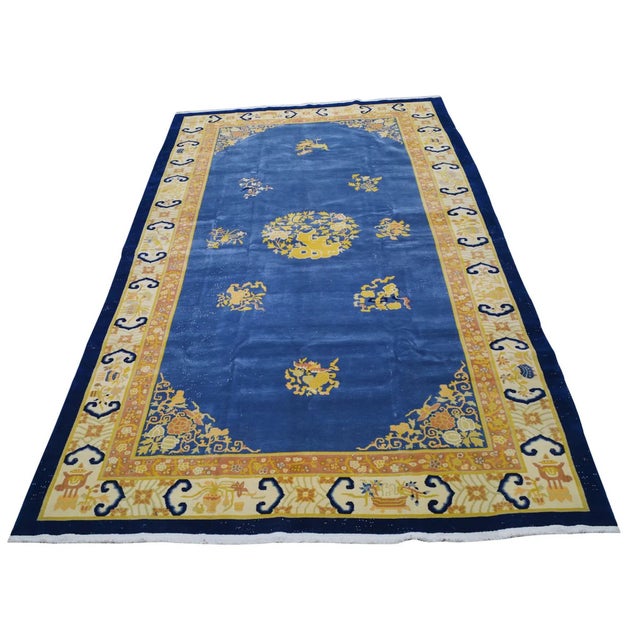 Hand-knotted with care using traditional rug-making techniques, this wool rug blends timeless craftsmanship with a modern...