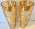 Pair of tall vintage vases with etched leaves on the exterior.