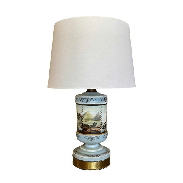 A fantastic lamp with a story! Hand painted scenes display historic monuments from around the globe, each depicted in...