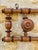 Large, vintage, french, wall-mount coat/hat rack with 3 pegs, circa 1890's. piece is is made of beechwood, and showcases a...