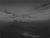 Black Cloud of Night by Todd Carpenter | Oil on Board Landscape with mountains and dark clouds For Sale