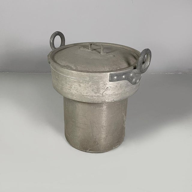 Italian round aluminum pot with lid, 1930s Pot or basket with lid, with round base, made entirely of aluminum. Two round...