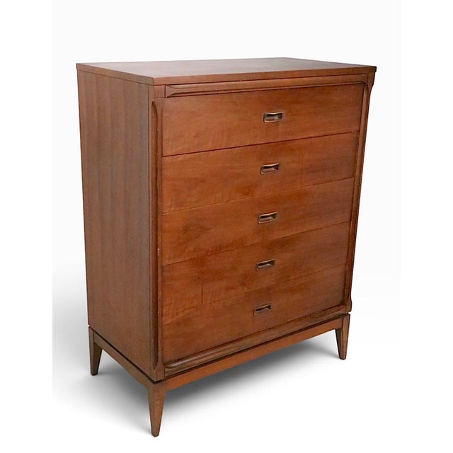 Classic Mid Century highboy chest of drawers, made for the former retail giant Montgomery Ward as part of the Sutton Place...
