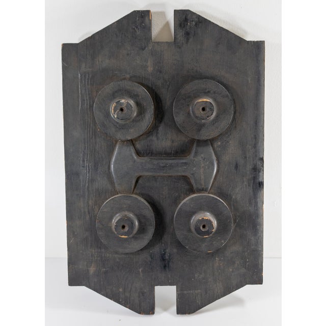 We are selling this super cool sculptural black painted mid-century wall décor. This piece was probably originally part of...